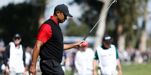 Tiger Woods of the United States reacts after a putt on the 13th green during the final round of the Genesis Invitational at the Riviera Country Club on February 19, 2023, in Pacific Palisades, California.