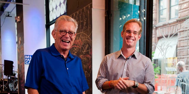 Fox's Tim McCarver, left, and Joe Buck laugh during a skit at the MLB Fan Cave on June 22, 2012, in New York City.