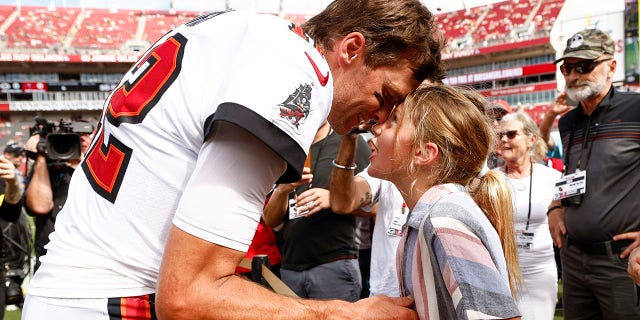 Tom Brady talks to his daughter Vivian