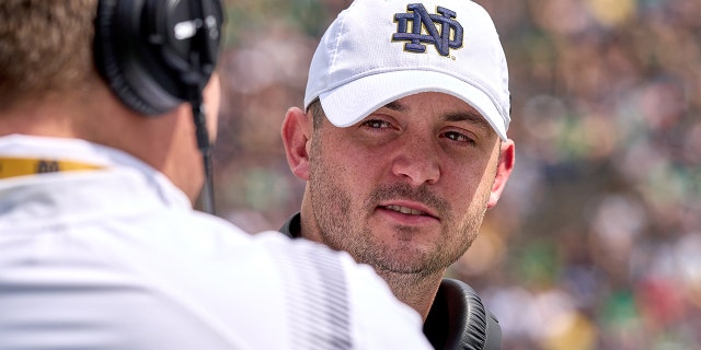 Notre Dame's Tommy Rees looks on during the Notre Dame Blue-Gold spring game on April 23, 2022, at Notre Dame Stadium in South Bend, Indiana.