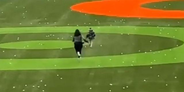 The pursuit of the child by a Topgolf employee drew laughter from golfers at the range in Wichita, Kansas.