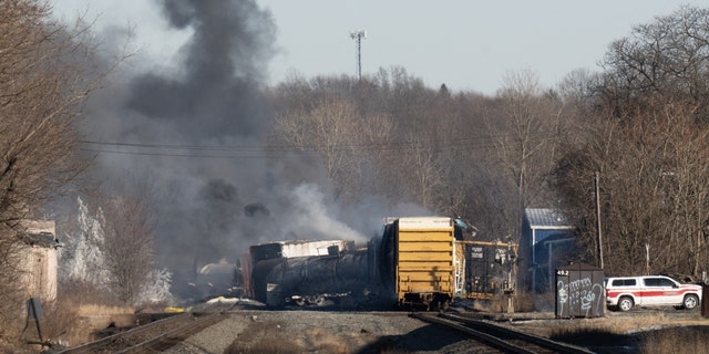 Smoke rises from a derailed cargo train in East Palestine, Ohio, on February 4, 2023. - The train accident sparked a massive fire and evacuation orders, officials and reports said Saturday. 