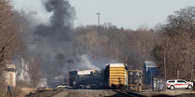 Smoke rises from a derailed cargo train in East Palestine, Ohio, on February 4, 2023. - The train accident sparked a massive fire and evacuation orders, officials and reports said Saturday. 