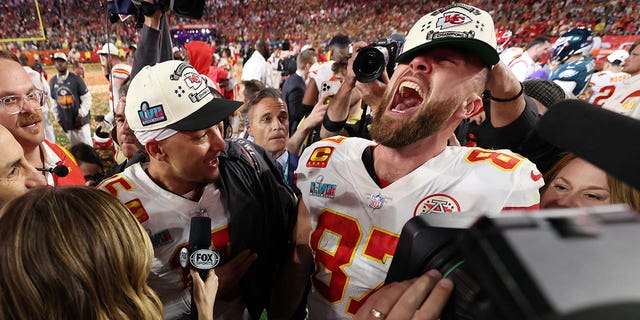 Patrick Mahomes #15 and Travis Kelce #87 of the Kansas City Chiefs celebrate after defeating the Philadelphia Eagles 38-35 in Super Bowl LVII at State Farm Stadium on February 12, 2023 in Glendale, Arizona.