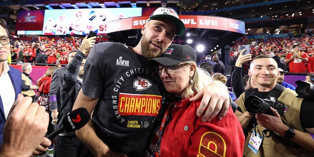Travis Kelce #87 of the Kansas City Chiefs celebrates with Donna Kelce after defeating the Philadelphia Eagles 38-35 in Super Bowl LVII at State Farm Stadium on February 12, 2023, in Glendale, Arizona. 