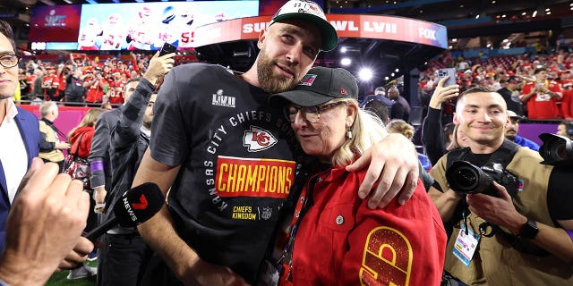 Travis Kelce, #87 of the Kansas City Chiefs, celebrates with Donna Kelce after defeating the Philadelphia Eagles 38-35 in Super Bowl LVII at State Farm Stadium on February 12, 2023, in Glendale, Arizona. 