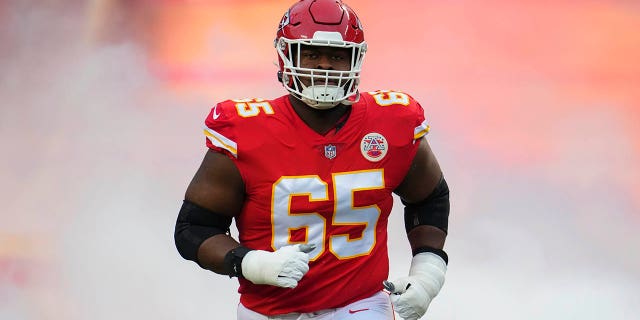 Trey Smith of the Kansas City Chiefs runs onto the field during introductions against the Jacksonville Jaguars at GEHA Field at Arrowhead Stadium Jan. 21, 2023, in Kansas City, Mo.