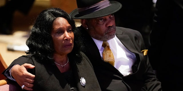 RowVaughn Wells, left, cries as she and her husband Rodney Wells attend the funeral service for her son Tyre Nichols at Mississippi Boulevard Christian Church in Memphis, Tennessee, on Wednesday, Feb. 1, 2023.