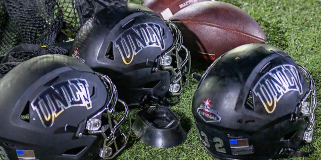 UNLV Rebels kicking helmets and team gear wait on the sidelines during the game between the UNLV Rebels and the San Jose State Spartans on Friday, October 7, 2022 at CEFCU Stadium in San Jose, California.