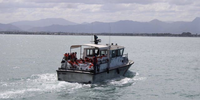 U.S. Coast Guard returns 309 men, women and children to Haiti after attempting to migrate to America by sea.