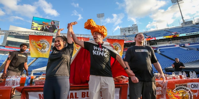 "Wing King" Drew Cerza proclaims Miki Sudo the victor over Joey Chestnut at the 2022 National Buffalo Wing Festival. Sudo ate 233 chicken wings in 12 minutes, to 224 for Chestnut. 