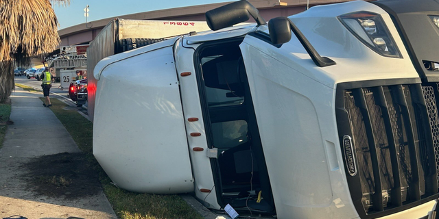 A truck carrying more than 1,000 cartons of milk overturned on a Florida highway Thursday morning.