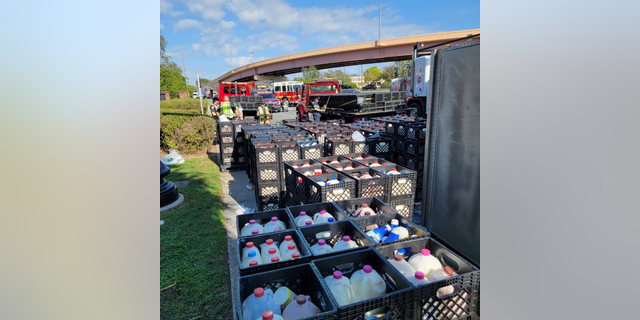 A fire department spokeswoman said the driver suffered minor injuries, adding that more than 1,000 cartons of milk were inside the truck at the time of the collision.