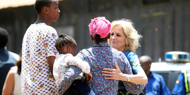 U.S. first lady Jill Biden, right, talks to a Kenyan mother in Kenya's slum Kibera in Nairobi, Kenya, Saturday, Feb. 25, 2023.