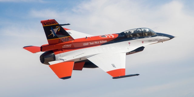 A modified F-16D Block 30 Peace Marble Il aircraft being flowing by an artificial intelligence program.