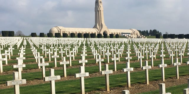 The Douaumont Ossuary in Verdun, France, is a huge haunting sanctuary housing the remains of both French and German soldiers, surrounded by a massive, largely tree-less cemetery of war dead.