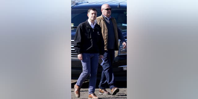 Transportation Secretary Pete Buttigieg arrives for a news conference Thursday, Feb. 23, 2023, near the site of the Feb. 3 Norfolk Southern train derailment in East Palestine, Ohio.