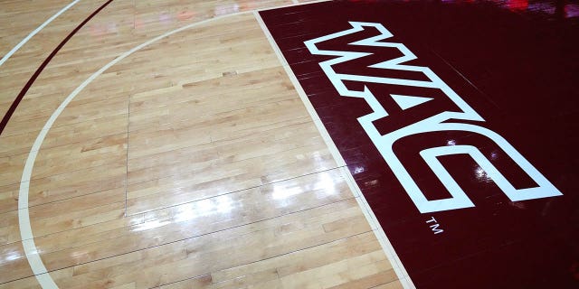 A Western Athletic Conference logo is shown on the court prior to the championship game of the Western Athletic Conference basketball tournament at the Orleans Arena on March 12, 2022 in Las Vegas.
