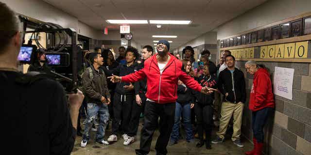 Will Keeps records a music video with students in a hallway on the Des Moines Public School central campus on January 29, 2016 in Des Moines, Iowa. Keeps says he plans to stay "everything in it" about helping children after he was shot in a shootout that killed two students.