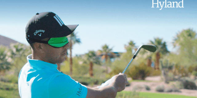 Xander Schauffele swings in the Hyland challenge.
