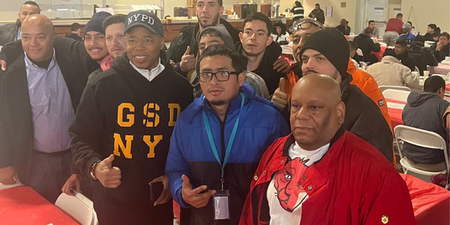 New York City Mayor Eric Adams poses for photo at Brooklyn Cruise Terminal.