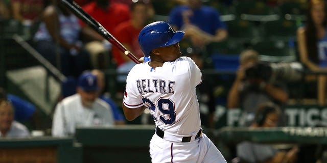 Adrian Beltre of the Texas Rangers hits a home run to complete the cycle in the fifth inning during a game against the Houston Astros at Globe Life Park in Arlington Aug. 3, 2015.