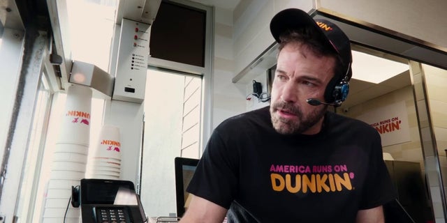 Ben Affleck works on the drive-thru in Dunkin's Super Bowl commercial.
