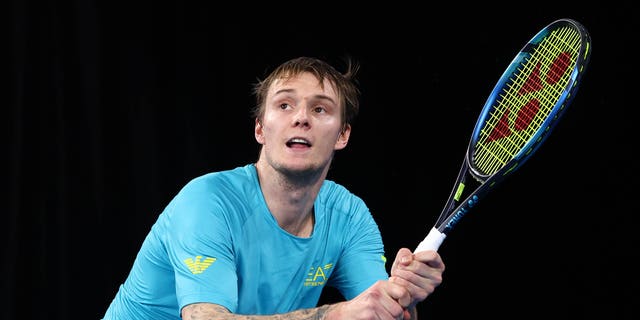 Alexander Bublik of Kazakhstan plays a backhand in his match against Hubert Hurkacz of Poland during day four of the United Cup 2023 at Pat Rafter Arena on January 1, 2023 in Brisbane, Australia.