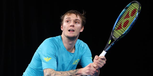 Alexander Bublik of Kazakhstan plays a backhand in his match against Hubert Hurkacz of Poland during day four of the 2023 United Cup at Pat Rafter Arena on January 01, 2023 in Brisbane, Australia.