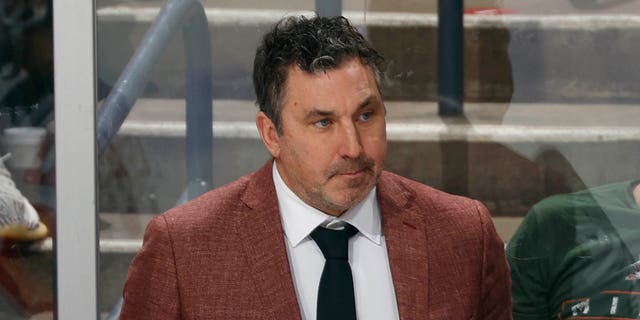 Assistant coach Andrew Brunette of the New Jersey Devils looks on during third period action against the Florida Panthers at the FLA Live Arena on December 21, 2022 in Sunrise, Florida.