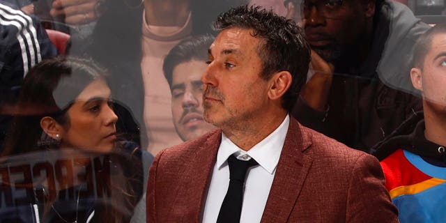 New Jersey Devils assistant coach Andrew Brunette looks on during second period action against the Florida Panthers at FLA Live Arena on December 21, 2022 in Sunrise, Florida.