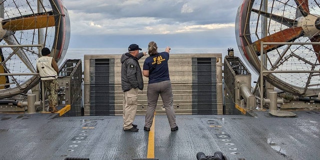 (Off the Coast of South Carolina) – FBI Agents search for possible material if the High Altitude Balloon off the coast of South Carolina.