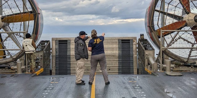 (Off the Coast of South Carolina) – FBI Agents search for possible material if the High Altitude Balloon off the coast of South Carolina.