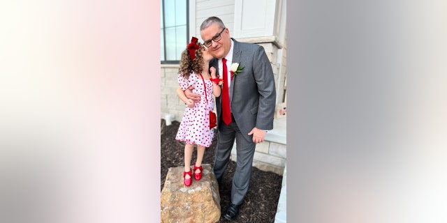 Austyn Woolverton, 5, and her grandpa, Steve Guenther, attended a local father-daughter dance for Valentine's Day.