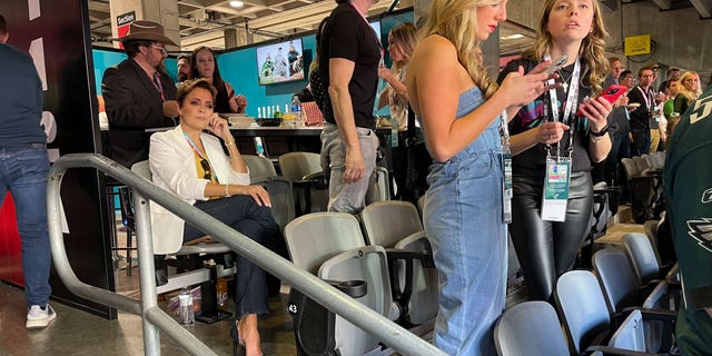 Former GOP Arizona gubernatorial candidate Kari Lake sits during the playing of the Black national anthem ahead of Super Bowl LVII on Sunday.