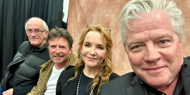 The cast of "Back to the Future" is all smiles during this happy reunion.