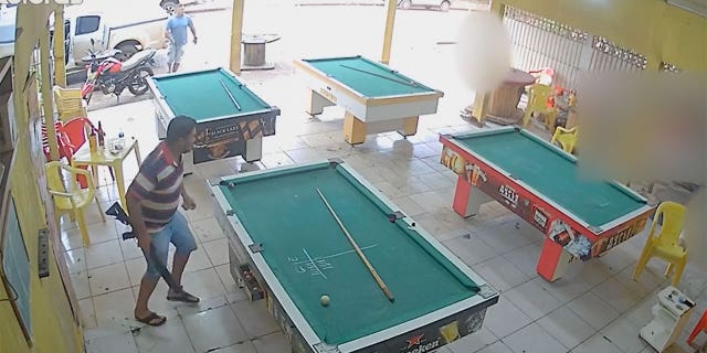 The alleged killers grabbed small amounts of cash on pool tables, as well as a woman’s purse on their way out.