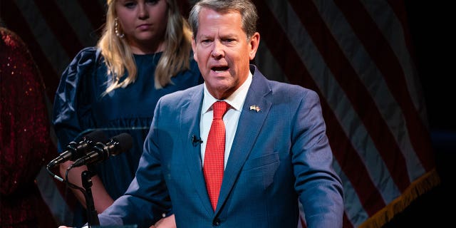 Georgia Gov. Brian Kemp speaks during a rally in Atlanta, Georgia, on Nov. 8, 2033. Kemp is supporting two bills that would target prosecutors who refuse to charge entire categories of crimes.