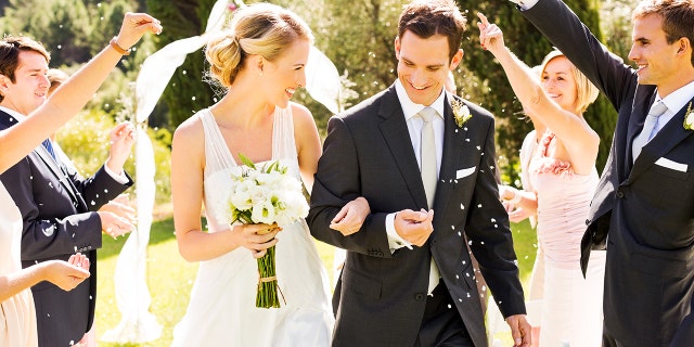 The Reddit user said she was told by her colleague (not pictured) that there would be no fees to attend her wedding — but that is not what the guest experienced, she revealed.