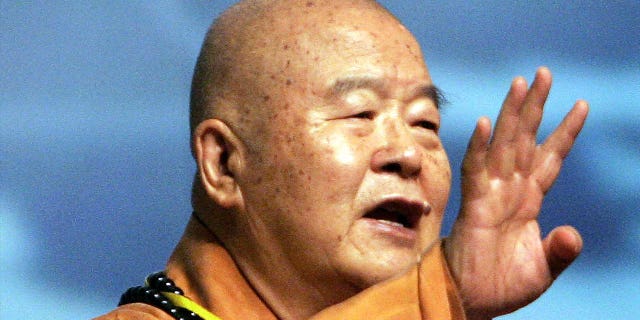 Hsing Yun, laminitis of Taiwanese Fo Guang Shan, delivers a reside astatine nan opening of nan World Buddhist Forum connected April 13, 2006, successful Hangzhou, China.