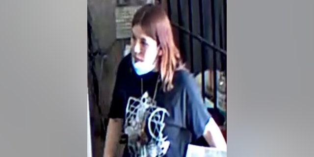The suspect was described as a lighter-complexioned female, 18 to 25 years old, with auburn hair.