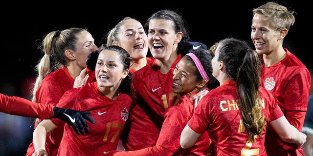Christine Sinclair, #12 of Canada, celebrates with her teammates after scoring a goal against Nigeria during a Celebration tour friendly match at Starlight Stadium on April 11, 2022, in Langford, British Columbia, Canada.  
