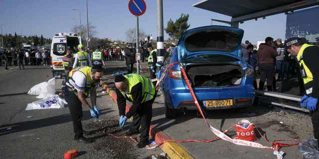The site of a car-ramming attack at a bus stop in Ramot, Jerusalem, is pictured above on Feb. 10, 2023. A driver drove his car into the stop killing two, and injuring five others.