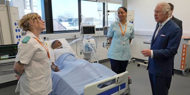 King Charles tours the University of East London. 