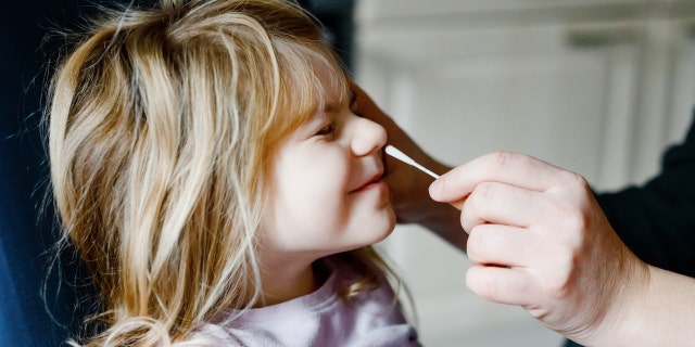 People 14 and older can self-collect their own nasal swab samples. Adults can also take samples for kids 2 and older.