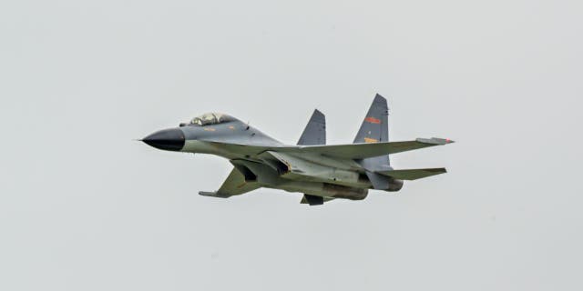 A J-11B fighter jet of the People's Liberation Army Air Force (PLAAF) 