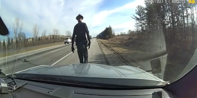 Wilson walked in front of his cruiser moments before being struck by his rear-ended car.