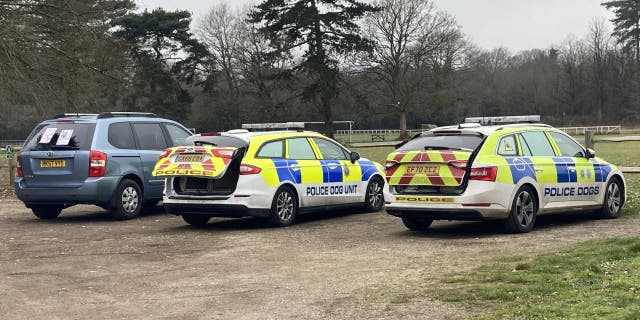 Sussex Police dog unit vehicles at Slindon Cricket Club in Arundel, West Sussex, where Laurel Aldridge, 62, was last seen on February 14.