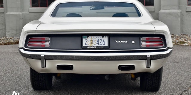 The car is equipped with a four-speed manual transmission. 