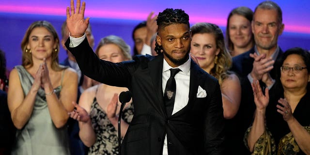 Damar Hamlin of the Buffalo Bills speaks in front of staff at the University of Cincinnati Medical Center during the NFL awards ceremony before a Super Bowl LVII football game, Thursday, Feb. 9, 2023, in Phoenix.